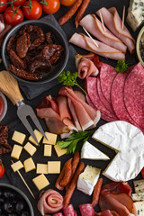 Antipasti platter. Cheese and meat appetizer selection.