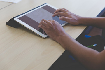 man's hand touching, using, digital tablet