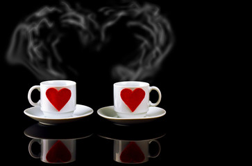 two cups with hearts and steam in the form of heart a reflection on a black background