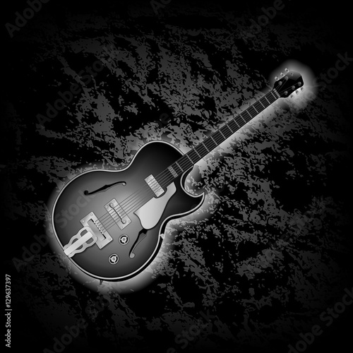 "Classical jazz guitar musical instrument on dark textural background