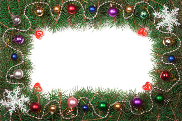 Christmas frame made of fir branches decorated with balls isolated on white background
