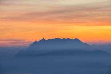 Fototapeta na wymiar Sunset over Huai Nam Dang National Park in Chiang Mai, North of Thailand