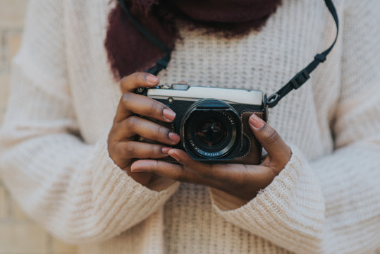 Woman holding camera