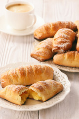 Homemade sweet buns with vanilla cream filling.