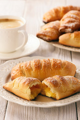 Homemade sweet buns with vanilla cream filling.