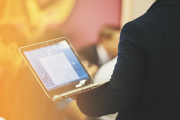 Modern work space concept - man with a laptop outside the office