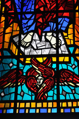 Stained glass depicting healt in the Catholic Cathedral, San Mateo Apostol in Osorno, Chile.
