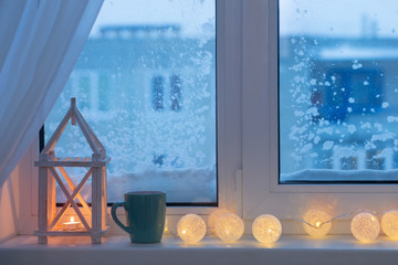 winter decor with candles and garland