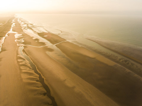 Camber Sands Beach at sunrise, Camber, near Rye, East Sussex