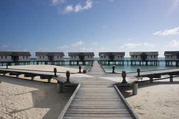 Fototapeta na wymiar Overwater Bungalows in the Maldives - Maldive Island Ocean Bungalow