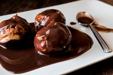 Profiteroles with chocolate cream.