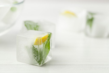 ice cubes with mint and lemon for cosmetics
