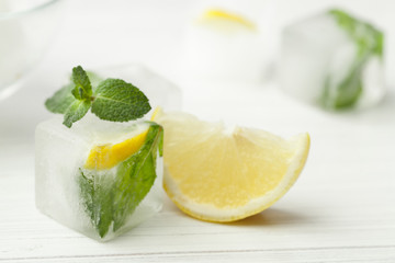 ice cubes with mint and lemon for cosmetics