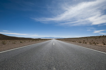 Road leading towards the Salinas Grandes (salt flats) near Purmamarca, Argentina