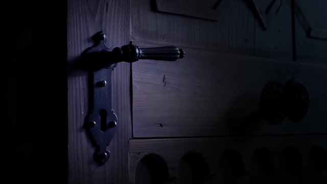 Pan shot of an antique wooden door