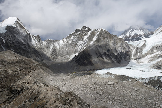 Everest Base Camp at 5350m seen here as a scattering of tents in the distance at the back of the Khumbu glacier, Khumbu Region, Nepal, Himalayas