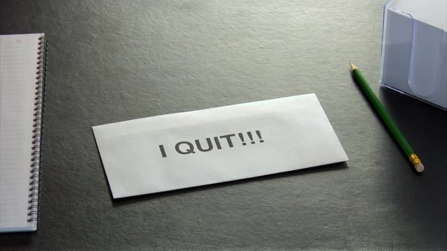 Quitting job. Throwing a letter at office desk