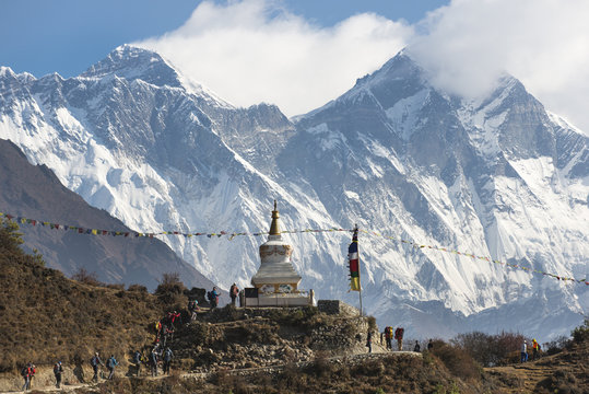 Hoards of trekkers make their way to Everest Base Camp, Mount Everest is the peak on the left, Khumbu Region, Nepal, Himalayas