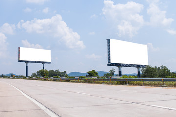 two blank billboard on the highway - 129651956