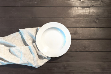 White Plate on a Tablecloth