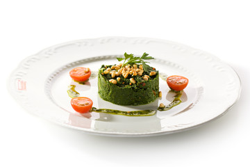 Spinach Garnish with Pesto Sauce and Tomato