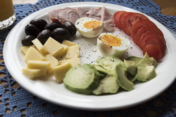 Healthy breakfast served on a white plate; 