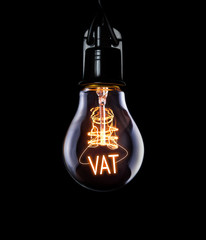 Hanging lightbulb with glowing VAT concept.