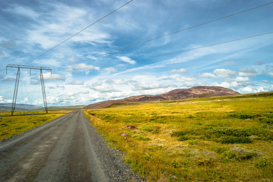 Isolated road and Icelandic landscape at Iceland, summer