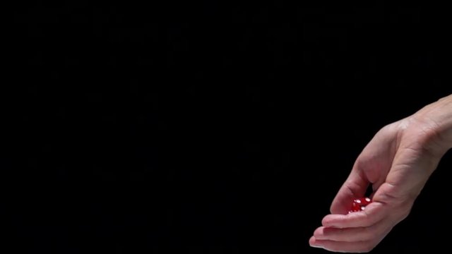 Hand throwing dice in slow motion. Concept film clip of chance, risk and success.