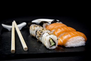 sushi set on black background