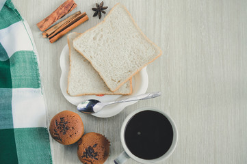 Breakfast on wood background.