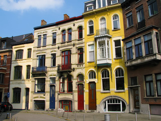 Fototapeta na wymiar Art Nouveau new art modern buildings in Ghent Belgium. Colorful life. City colors. Difference