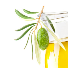 Green Olive and Glass Bottle of Organic Olive Oil Isolated on Wh