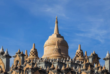 Sandstone pagoda on blue sky in wat  Pa Kung temple at Roi Et of Thailand