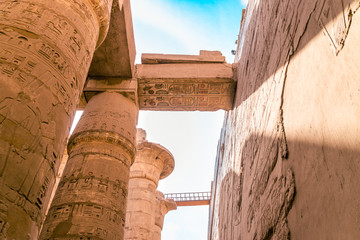 LUXOR, EGYPT: Ancient ruins of Karnak temple in Egypt at noon. The complex is a vast open-air...