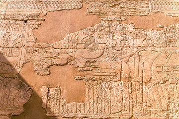 LUXOR, EGYPT: Ancient ruins of Karnak temple in Egypt at noon. The complex is a vast open-air...
