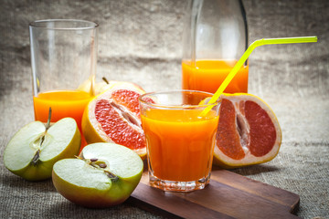 Juice of apples and red grapefruit.