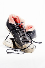 Old shoes on white background