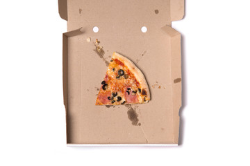 Top view of slice of tasty pizza in box