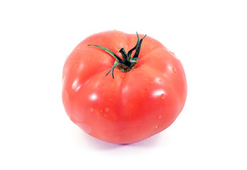 Bright red organic fresh heirloom tomato