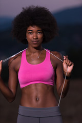 Fototapeta na wymiar portrait of african american woman jogging in nature