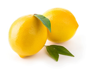 Two fresh lemons with leaves
