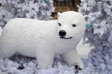 Christmas decoration polar bear, Christmas presents on wooden table.