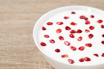 Yogurt and pomegranate seeds