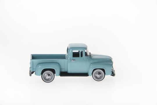 Green Toy Pickup on White Background
