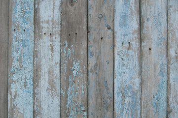 Blue old wooden fence. wood palisade background. planks texture