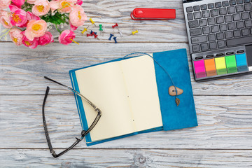 stationery, flowers and notepad