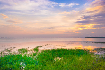 Fototapeta na wymiar Beautiful landscape, Sunset over lake in thailand.