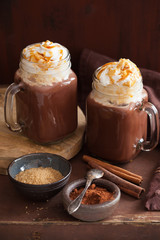 hot chocolate with whipped cream caramel in mason jar