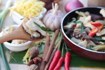 Stir fried chicken, ginger and fresh ginger sliced.